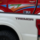 Image for article titled The 2021 Ford F-250 Lariat Tremor With A Ramp Kit Makes A Pretty Great Way To Haul A Changli Across The Country